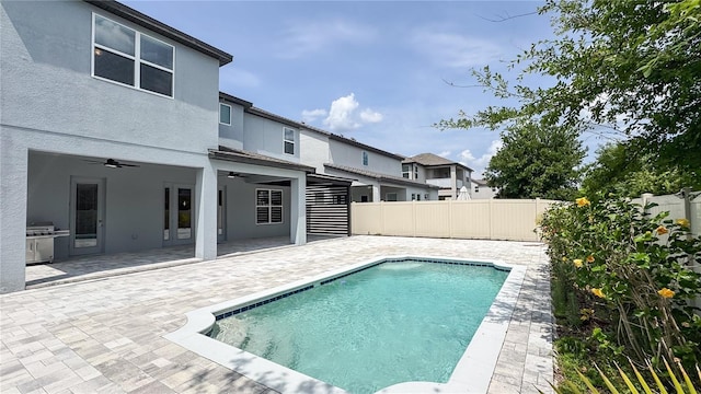 9917 Summerlake Groves St, Winter Garden, FL 34787 - view of swimming pool featuring ceiling fan, fence, and a patio