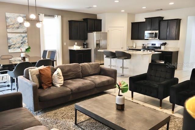 living room with recessed lighting