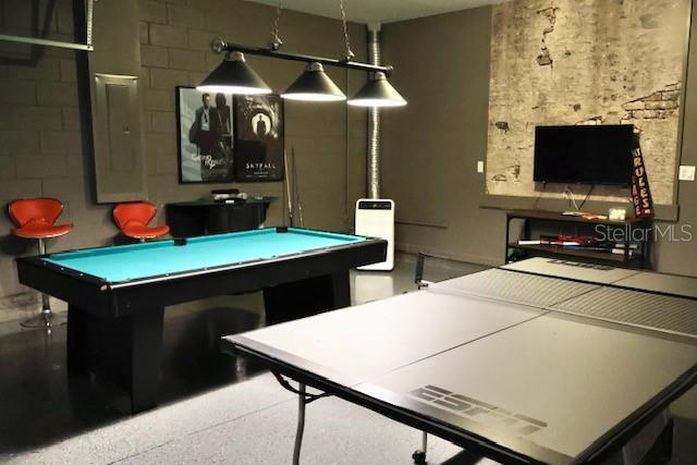 recreation room with pool table and electric panel
