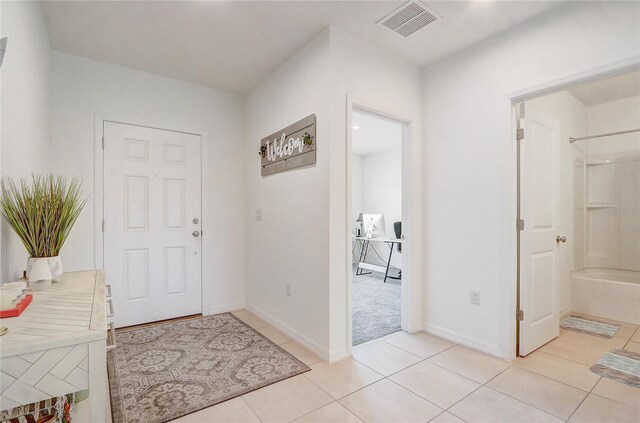 392 Citrine Loop, Kissimmee, FL 34758 - foyer with light tile patterned floors