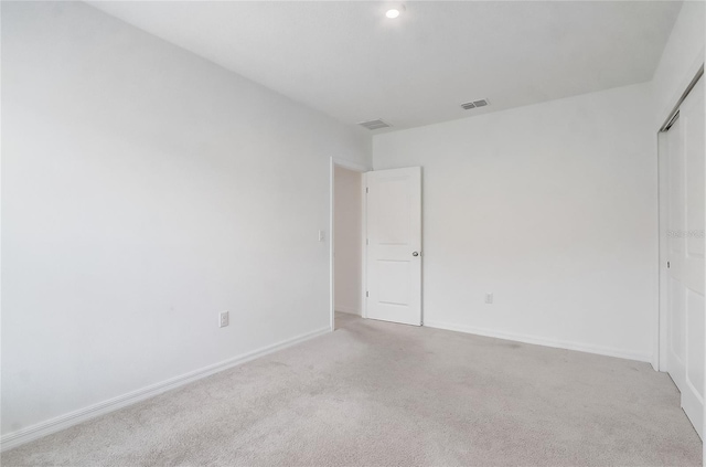 392 Citrine Loop, Kissimmee, FL 34758 - unfurnished bedroom featuring carpet floors and a closet