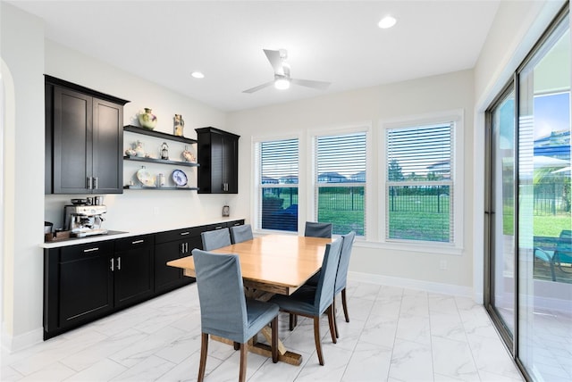 16696 Otterchase Ln, Winter Garden, FL 34787 - dining area with light marble finish floors, recessed lighting, a ceiling fan, and baseboards
