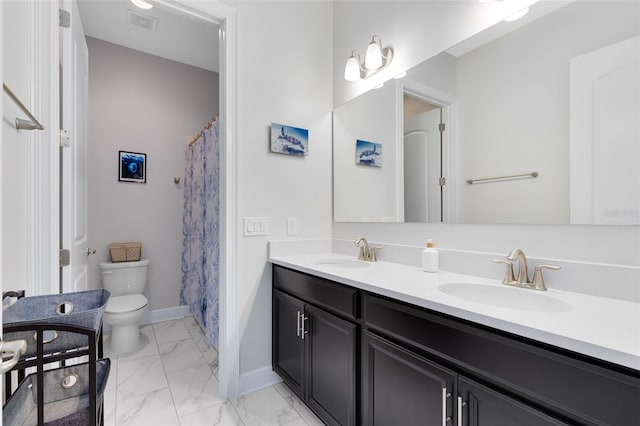 16696 Otterchase Ln, Winter Garden, FL 34787 - full bath featuring marble look tiles, toilet, baseboards, and double vanity