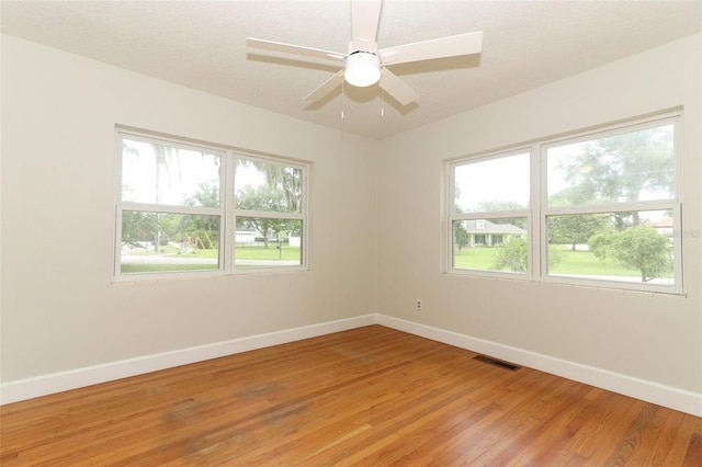 656 Lake Charm Dr, Oviedo, FL 32765 - spare room with baseboards and light wood finished floors