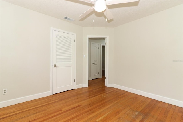 656 Lake Charm Dr, Oviedo, FL 32765 - spare room with baseboards, ceiling fan, and light wood-type flooring