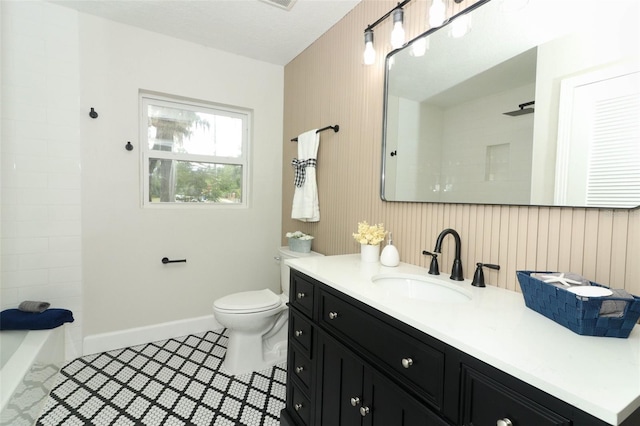 656 Lake Charm Dr, Oviedo, FL 32765 - full bathroom with toilet, baseboards, vanity, tile patterned flooring, and washtub / shower combination