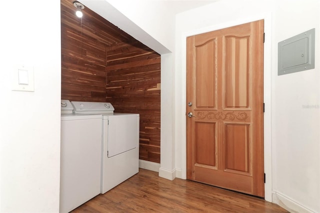 656 Lake Charm Dr, Oviedo, FL 32765 - clothes washing area with washer and clothes dryer, electric panel, and light wood-style floors