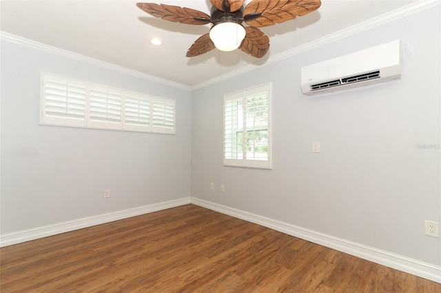 656 Lake Charm Dr, Oviedo, FL 32765 - unfurnished room featuring an AC wall unit, wood finished floors, crown molding, baseboards, and a ceiling fan