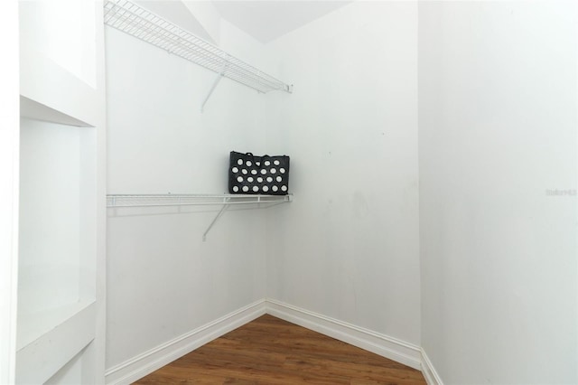 656 Lake Charm Dr, Oviedo, FL 32765 - walk in closet featuring wood finished floors