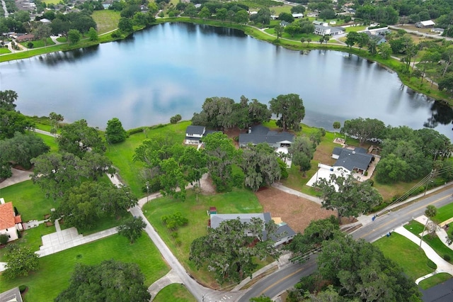 656 Lake Charm Dr, Oviedo, FL 32765 - aerial overview of property's location featuring a nearby body of water, nearby suburban area, and a tree filled landscape