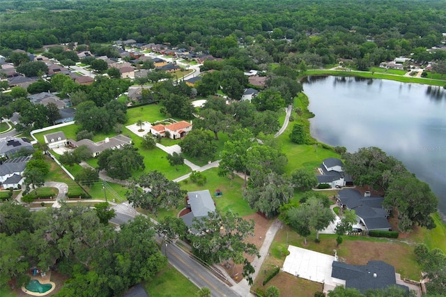 656 Lake Charm Dr, Oviedo, FL 32765 - aerial view of property and surrounding area featuring a nearby body of water, nearby suburban area, and a heavily wooded area