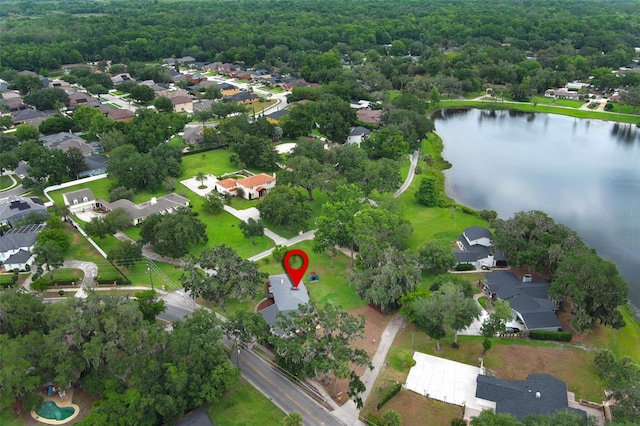 656 Lake Charm Dr, Oviedo, FL 32765 - aerial view of property's location featuring a nearby body of water, nearby suburban area, and a forest