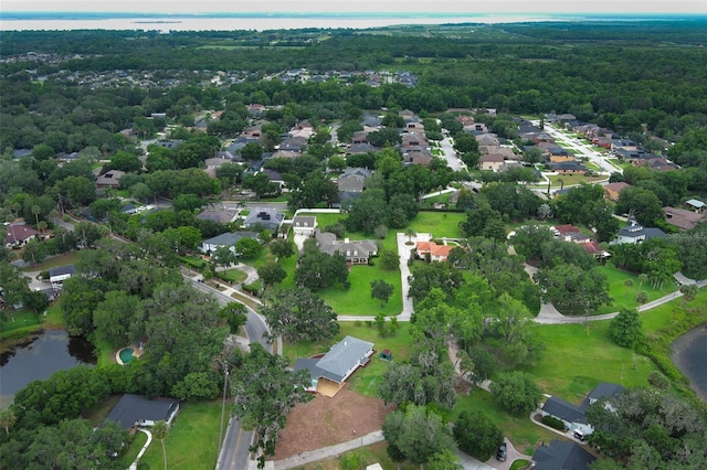 656 Lake Charm Dr, Oviedo, FL 32765 - view of property location featuring a nearby body of water, a heavily wooded area, and nearby suburban area