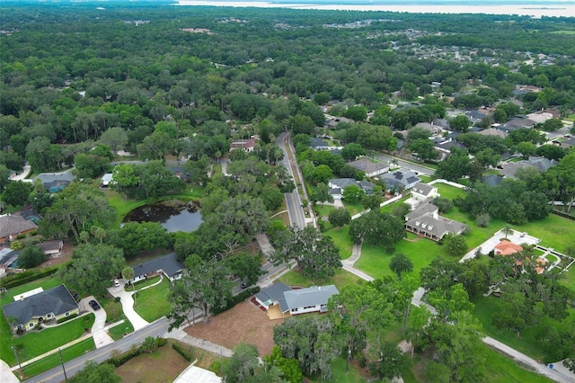 656 Lake Charm Dr, Oviedo, FL 32765 - aerial view of property's location with a large body of water, a heavily wooded area, and nearby suburban area