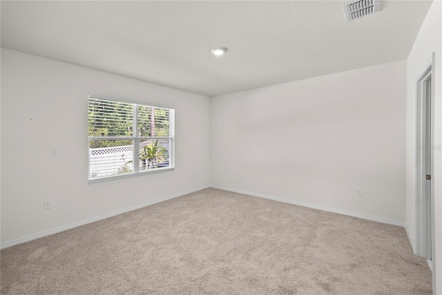 280 Caryota Ct, New Smyrna Beach, FL 32168 - unfurnished room featuring carpet floors and baseboards