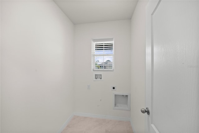 280 Caryota Ct, New Smyrna Beach, FL 32168 - laundry room featuring electric dryer hookup, washer hookup, baseboards, and light tile patterned floors