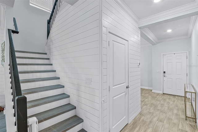 1123 Dora Parc Ln, Mount Dora, FL 32757 - stairway featuring crown molding, wood finished floors, baseboards, and recessed lighting