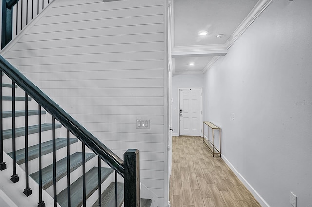 1123 Dora Parc Ln, Mount Dora, FL 32757 - stairway with ornamental molding, baseboards, wood finished floors, and recessed lighting