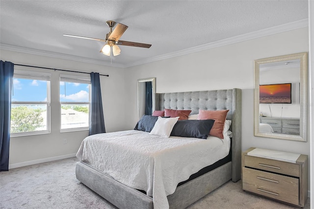 1123 Dora Parc Ln, Mount Dora, FL 32757 - bedroom with light carpet, baseboards, ornamental molding, ceiling fan, and a textured ceiling