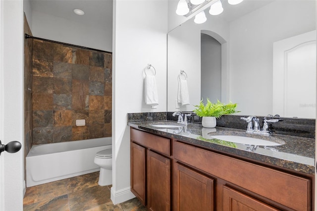 8692 Tavistock Lakes Blvd, Orlando, FL 32827 - bathroom featuring double vanity, stone finish flooring, and washtub / shower combination
