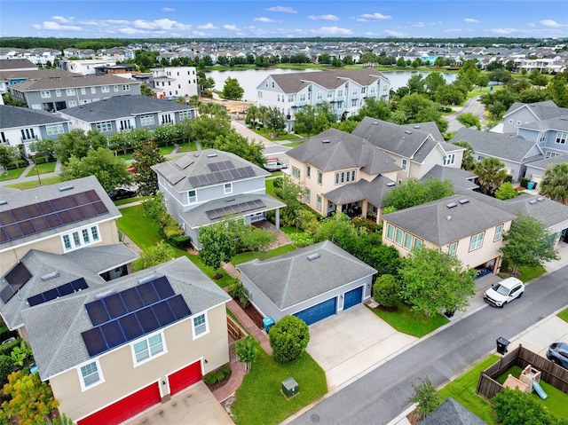 8692 Tavistock Lakes Blvd, Orlando, FL 32827 - aerial perspective of suburban area featuring a nearby body of water