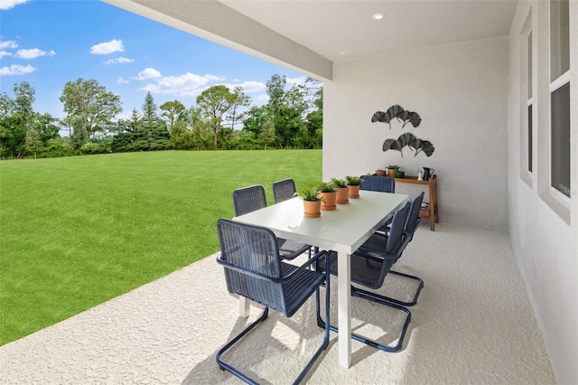 view of patio with outdoor dining area