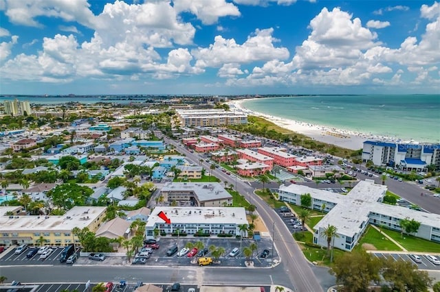 aerial view of waterfront with a beach