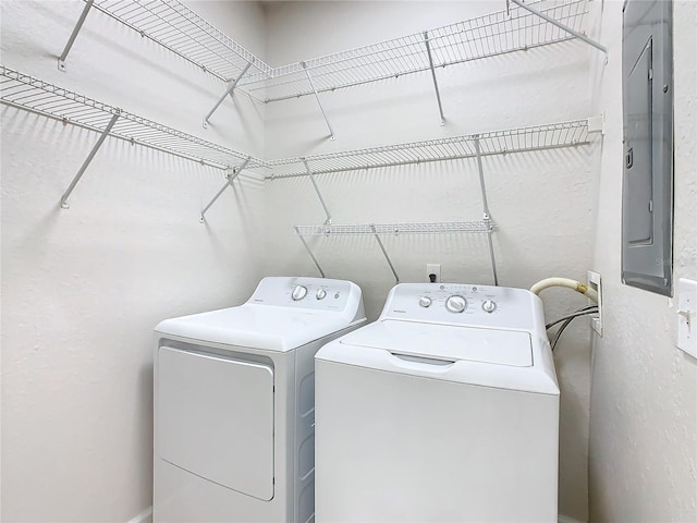 3000 Laurel Park Ln Unit 202, Kissimmee, FL 34741 - laundry area featuring washer and clothes dryer and electric panel