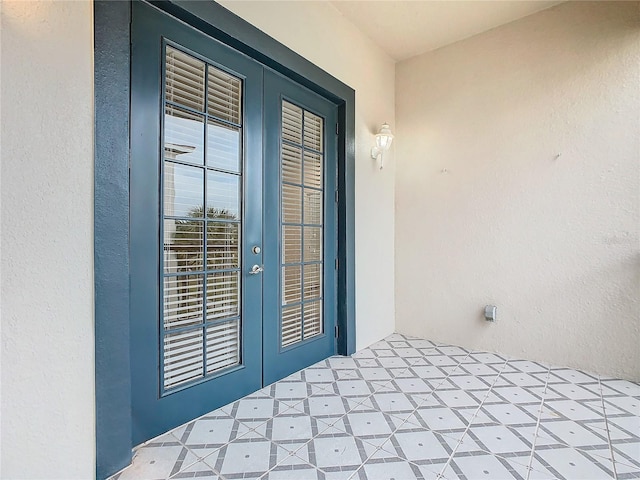 3000 Laurel Park Ln Unit 202, Kissimmee, FL 34741 - entrance to property featuring french doors and stucco siding