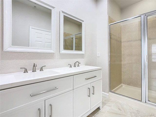 3000 Laurel Park Ln Unit 202, Kissimmee, FL 34741 - bathroom featuring a stall shower and double vanity