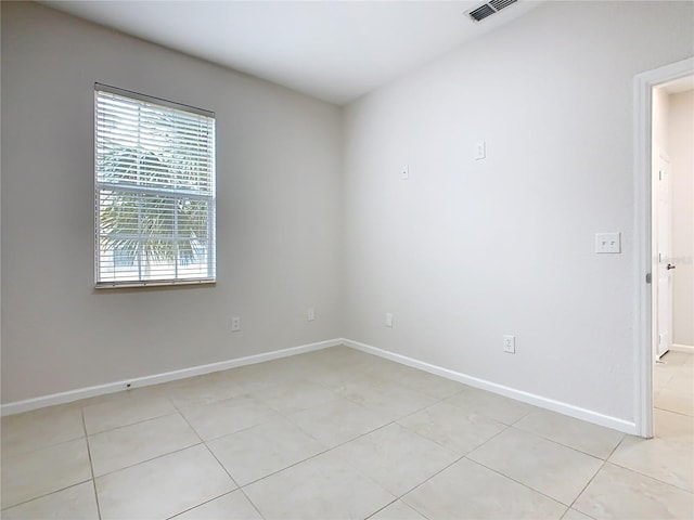 3000 Laurel Park Ln Unit 202, Kissimmee, FL 34741 - unfurnished room with light tile patterned flooring and baseboards