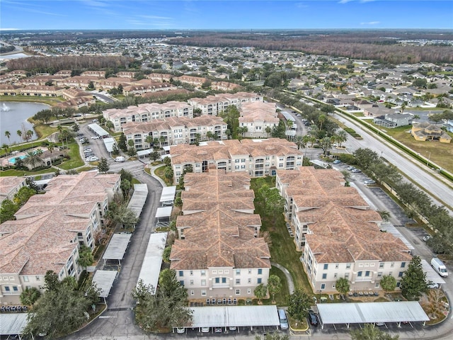 3000 Laurel Park Ln Unit 202, Kissimmee, FL 34741 - aerial view of property's location with a nearby body of water and nearby suburban area