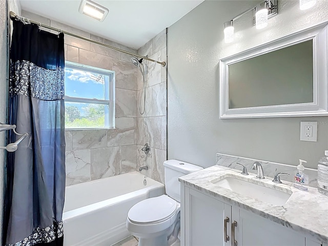 bathroom featuring toilet, shower / tub combo with curtain, and vanity