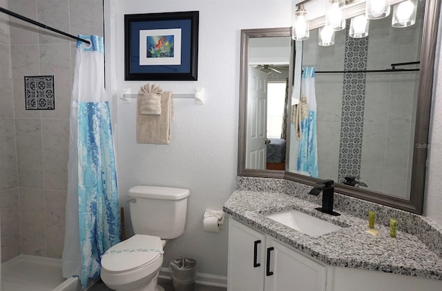 full bath with a stall shower, toilet, and vanity