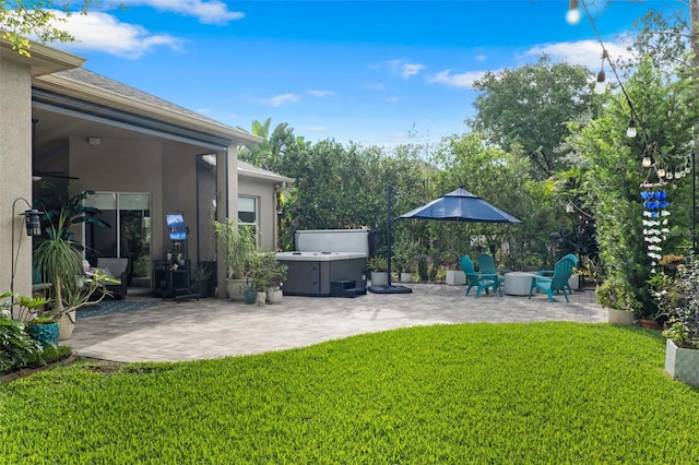 view of grassy yard with a patio area