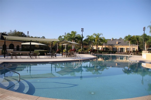 community pool with a patio