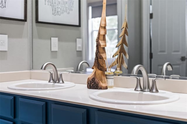 bathroom featuring double vanity