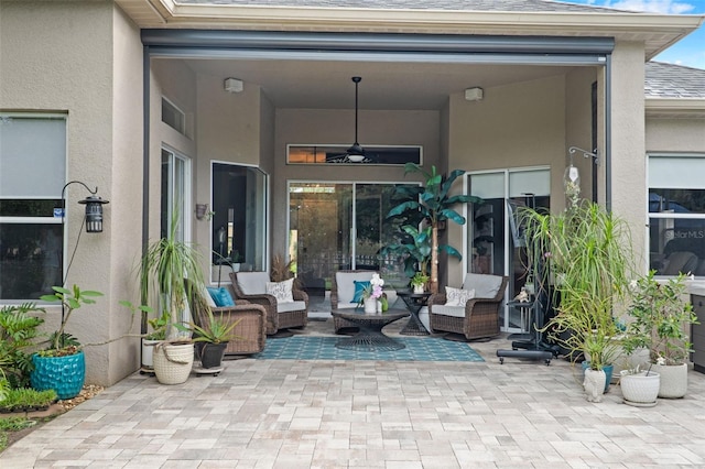view of patio featuring an outdoor hangout area and ceiling fan