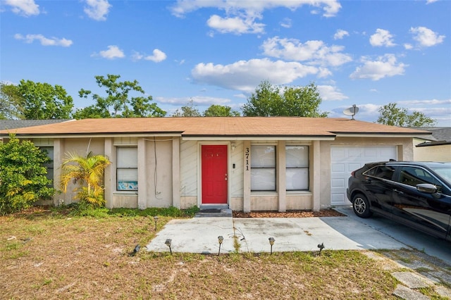 3711 Shady Grove Cir, Orlando, FL 32810 - view of front of property featuring an attached garage