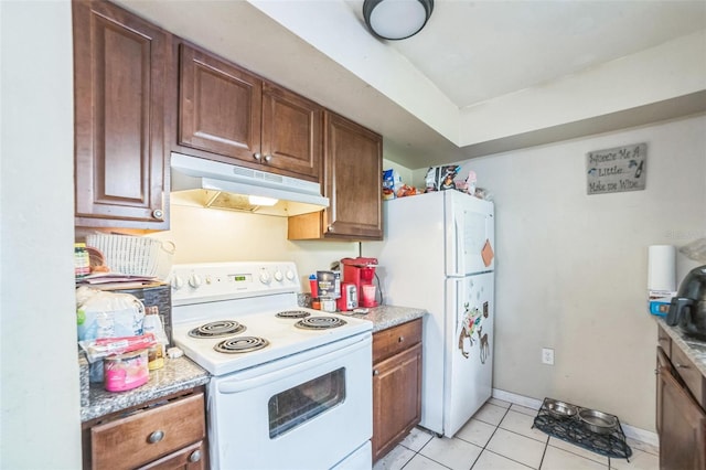 3711 Shady Grove Cir, Orlando, FL 32810 - kitchen with white appliances, under cabinet range hood, light countertops, and brown cabinets