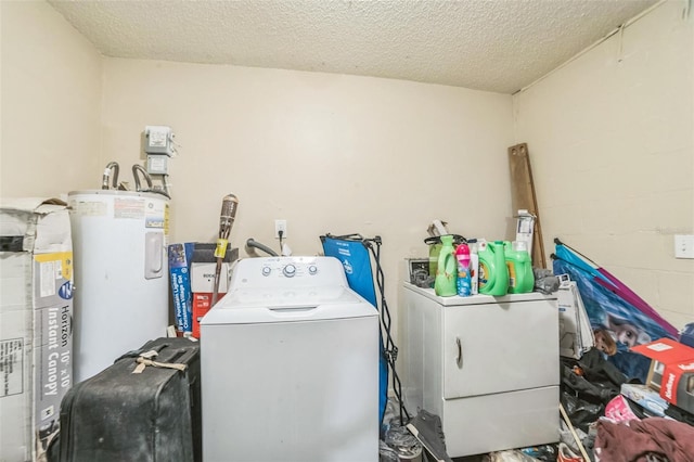 3711 Shady Grove Cir, Orlando, FL 32810 - laundry area featuring washing machine and dryer, concrete block wall, water heater, and a textured ceiling