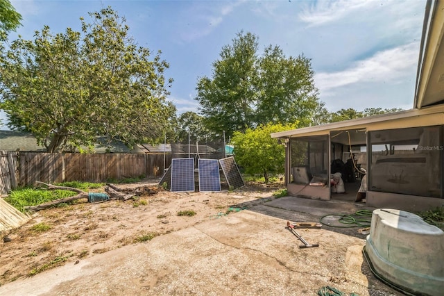 3711 Shady Grove Cir, Orlando, FL 32810 - view of patio / terrace with a sunroom and a fenced backyard