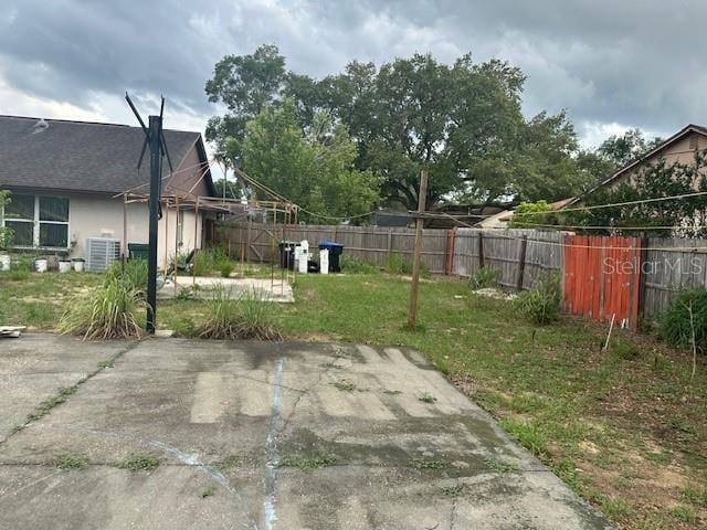 7625 Jarvis Ct, Orlando, FL 32818 - view of yard with a patio area