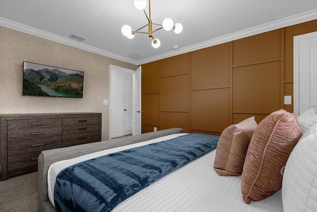 carpeted bedroom with a chandelier and crown molding