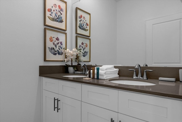 full bathroom featuring double vanity