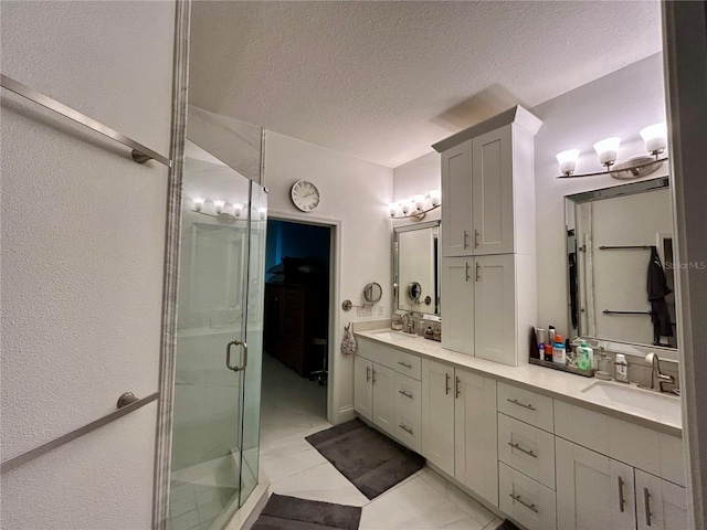 4412 Conroy Club Dr, Orlando, FL 32835 - bathroom with a shower stall, a textured ceiling, double vanity, a textured wall, and tile patterned flooring