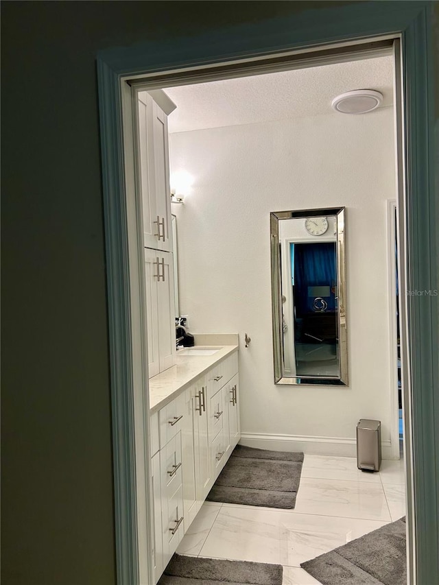 4412 Conroy Club Dr, Orlando, FL 32835 - bathroom with vanity and baseboards