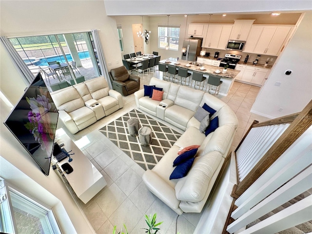 living room with light tile patterned floors