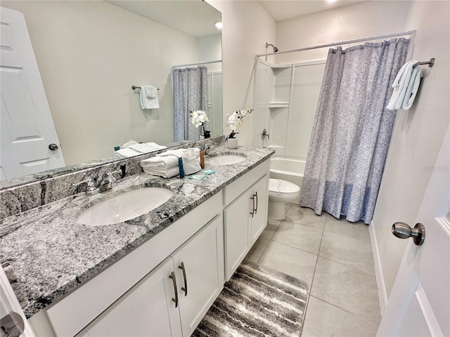 full bathroom with double vanity, shower / bath combination with curtain, toilet, and tile patterned floors