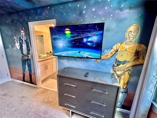 home theater featuring carpet flooring and baseboards